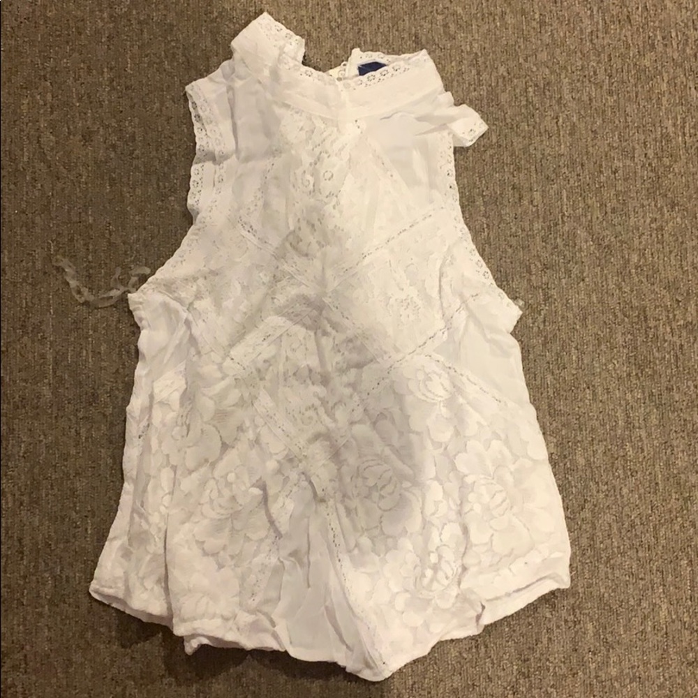 Brand new white sleeveless blouse